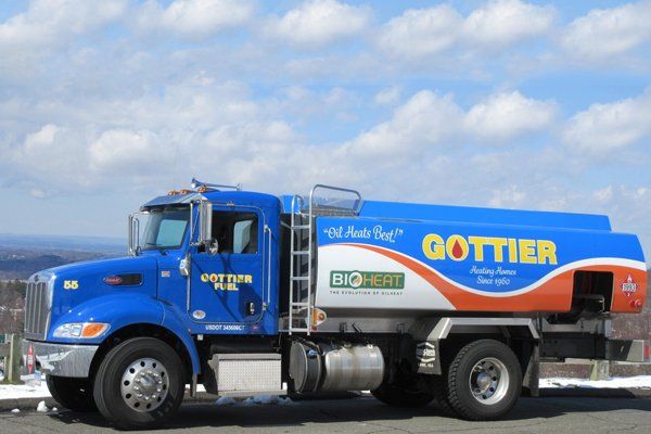 A Gottier Fuel Company delivery truck — blue tank, Gottier in orange lettering, Bioheat certified